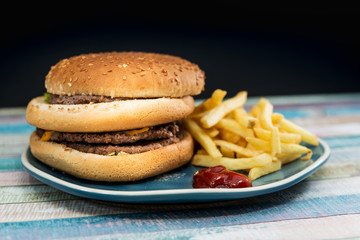 Cheese burger - American cheese burger with Golden French fries