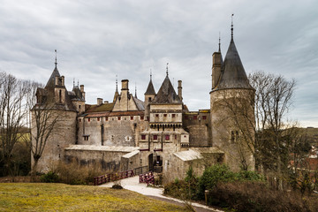 Old medieval Rochepot castle in Burgundy, spring day