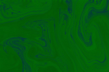 Suminagashi marble texture hand painted with green ink. Digital paper 673 performed in traditional japanese suminagashi floating ink technique. Fair liquid abstract background.
