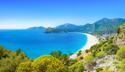Fototapeta na wymiar Blue lagoon and beach in Oludeniz, Turquoise Coast of southwestern Turkey