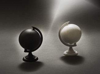 Black and White Globes Worlds Divided