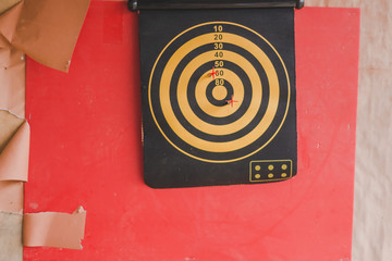 students Throw darts for skill test.