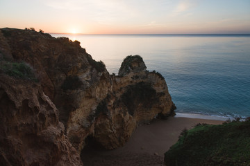 Sunrise in Lagos, Portugal. Sun Rising Over Rock Formation