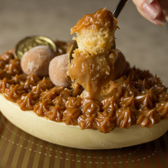 Easter Egg with cake and douce de leche, a spon taking a piece. delicius and beautiful. 