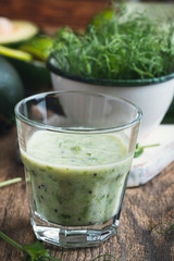 Green pear sprouts, fresh vegetables and smoothie for healthy meal