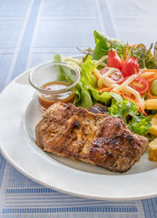 Grilled steak on dish