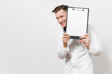 Smiling young doctor man isolated on white background. Male doctor in medical uniform, stethoscope health card on notepad folder. Blank sheet. Healthcare personnel, health medicine concept. Copy space