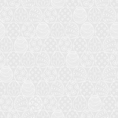 Easter eggs in white outline line up on.