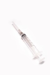 Fototapeta premium Medical syringe closeup on white background isolated