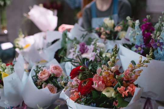 A large number of different flowers in the flower market