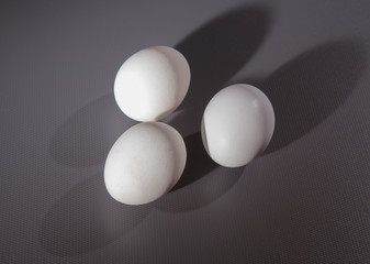 three white chicken eggs