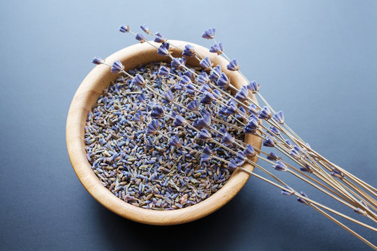 Dry lavender flowers buds in wooden bowl