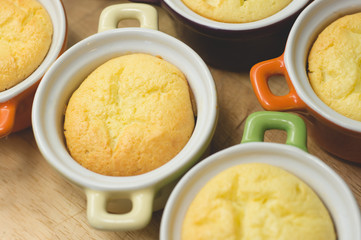 Cottage cheese casserole in colored ceramic forms in the form of pans. kid's food