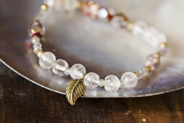 Beautiful yoga bracelet on natural background