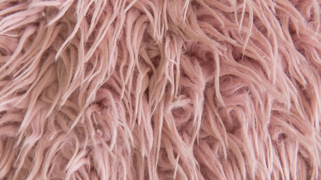 Close-up texture faux pink fur. Artificial fur