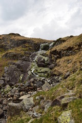 Craggy waterfall rocks moss covered