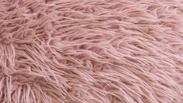 Close-up texture faux pink fur. Artificial fur