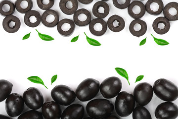 whole and sliced black olives isolated on white background with copy space for your text. Top view. Flat lay pattern