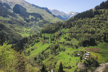 scenic view of field and mountains against clear sky 