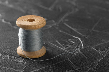 sewing thread on an old wooden spool