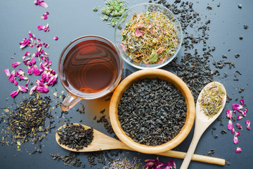 variety of black and herbal dry tea leaves, top view