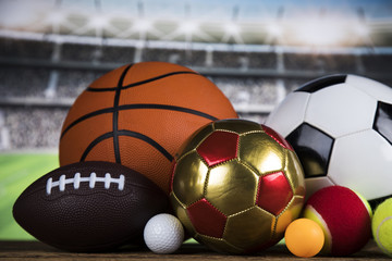 Sports balls with equipment