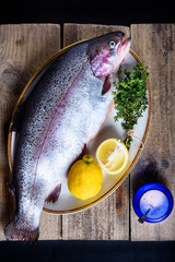 Raw salmon with pink salt, herbs  and lemon.