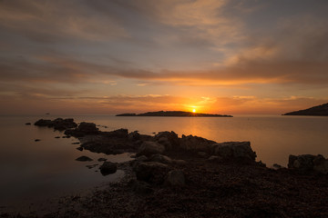 Fototapeta premium Cala de Sal rossa at sunrise in Ibiza