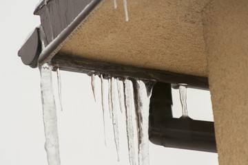 Icicles hanging from the home gutter