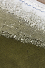 Fototapeta na wymiar aerial view of the ice on the beach