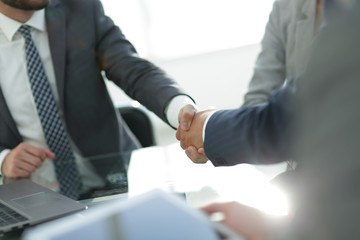 confident handshake of business partners