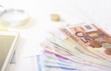 money stack on office desk