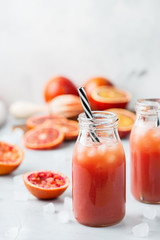 Fresh red blood orange juice in a bottle