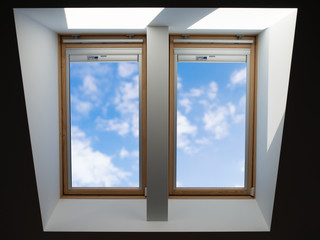 roof windows overlooking the blue slightly cloudy sky