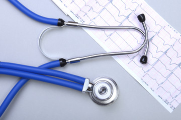 Stethoscope, red heart, RX prescription on white table with space for text. © v_l