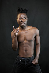 Obraz premium emotions black young man on a black background