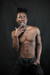 Obraz premium emotions black young man on a black background