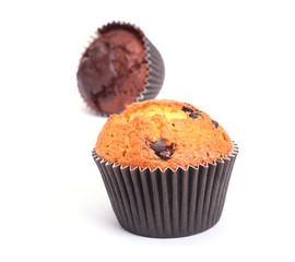Homemade muffin with raisins and chocolate cupcake. selective focus