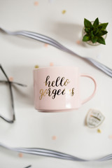 Pink Hello Gorgeous Coffee Mug on White Desk