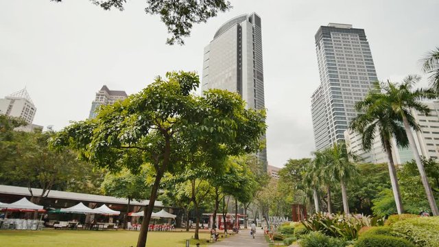 Gardens and skyscrapers seen at Ayala Triangle Park, in Makati, Metro Manila.