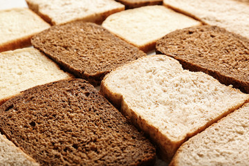 Slices of wheat and rye bread, closeup