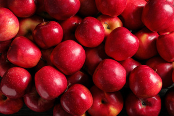 Fresh ripe red apples as background