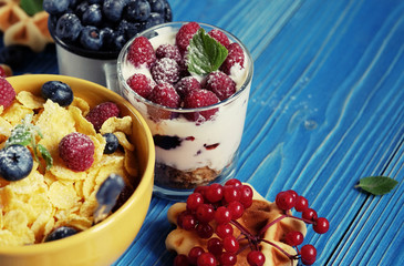 healthy eating and diet concept: Corn flakes with raspberries an