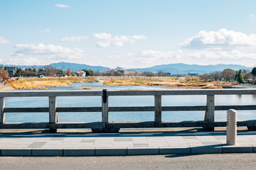 Fototapeta na wymiar Arashiyama Togetsukyo bridge and countryside village in Kyoto, Japan