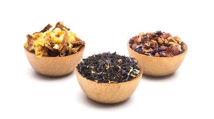 Loose Leaf Tea in a Wooden Bowls on a White Background