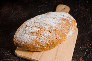 artisan bread on black background