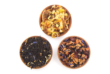Loose Leaf Tea in a Wooden Bowls on a White Background
