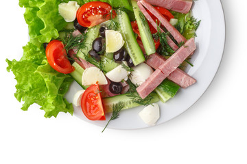 Fresh vegetable salad in a plate. Restaurant serving. Isolated.