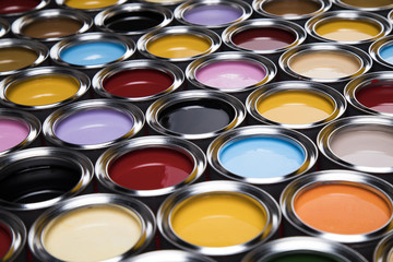 Fototapeta premium Buckets full of rainbow colored oil paint