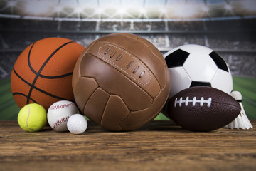 Sports balls with equipment